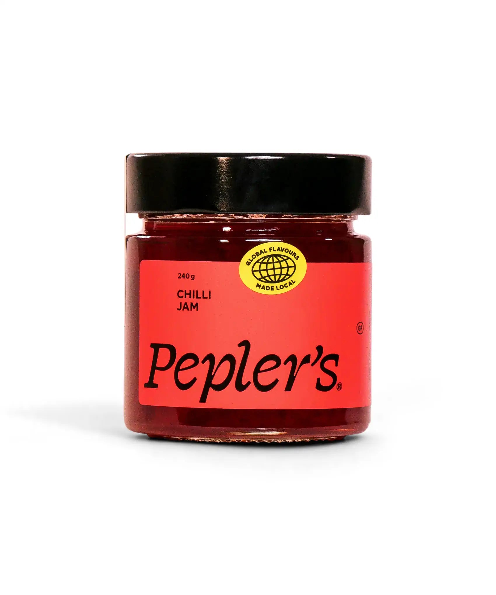 A jar of Pepler's Chilli Jam, featuring a vibrant red label with bold black text stating "Chilli Jam." The jar is sealed with a black lid and includes a yellow sticker with the text "Global Flavours Made Local." The jar contains 240 grams of the jam and is set against a plain white background.