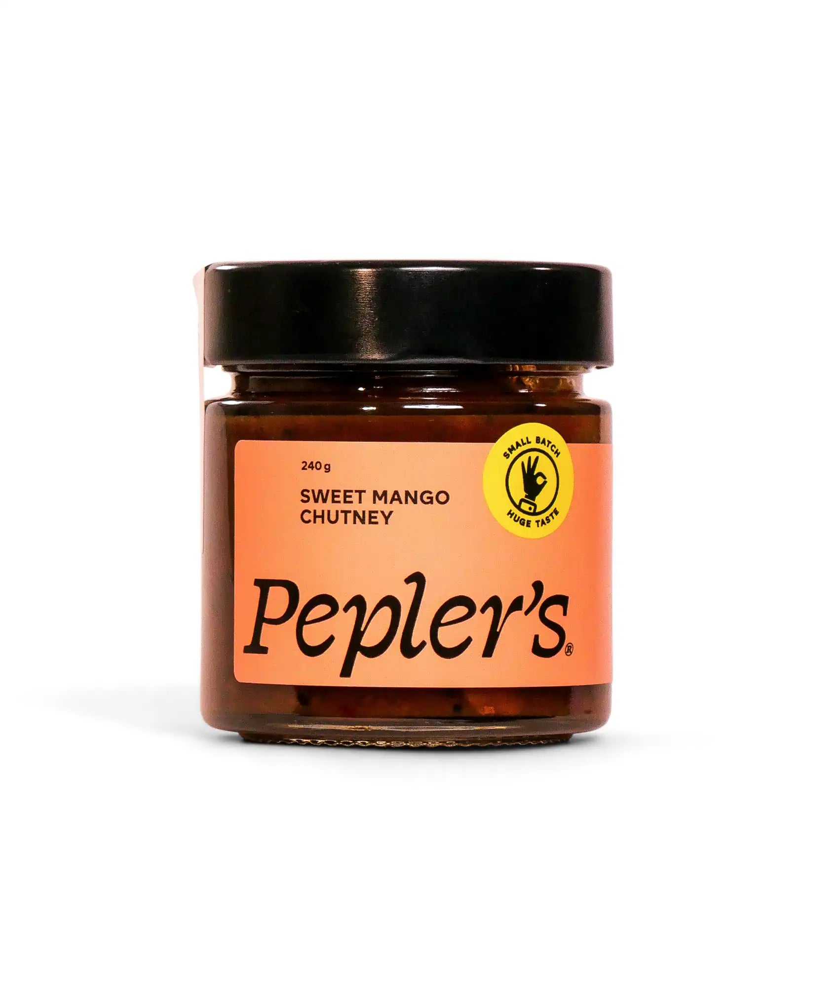 A jar of Pepler's Sweet Mango Chutney, weighing 240 grams. The jar features a vivid orange label with bold black text, clearly displaying the product name. A circular yellow emblem on the label highlights the phrase "Small Batch Huge Taste." The jar is set against a plain white background.