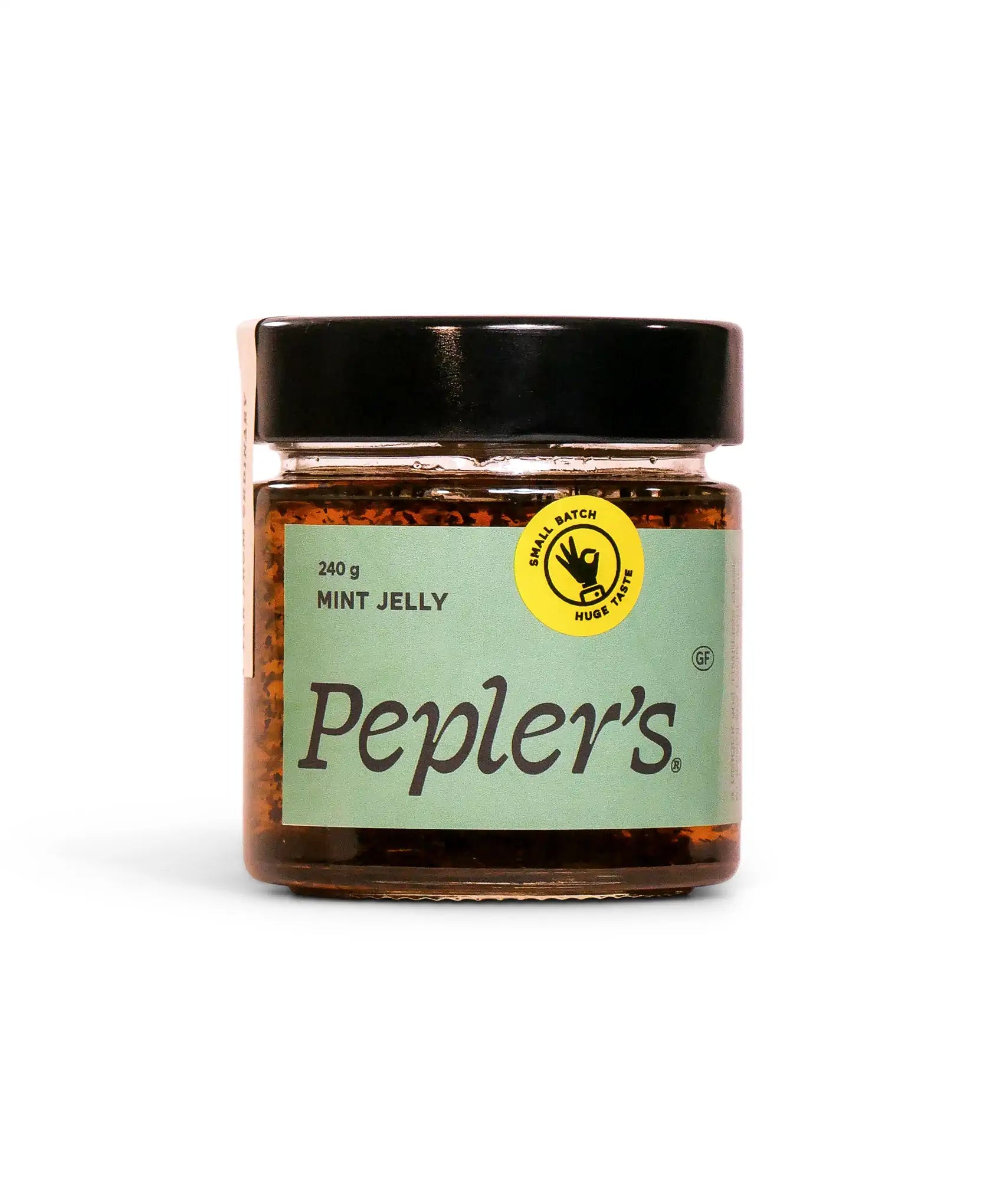 A jar of Pepler's mint jelly, labeled with a mint green background and black lid. The jar contains 240 grams of jelly, and features a circular yellow seal that reads "Small Batch Huge Taste." The product is gluten-free. The background is plain white, emphasising the jar's design and label.