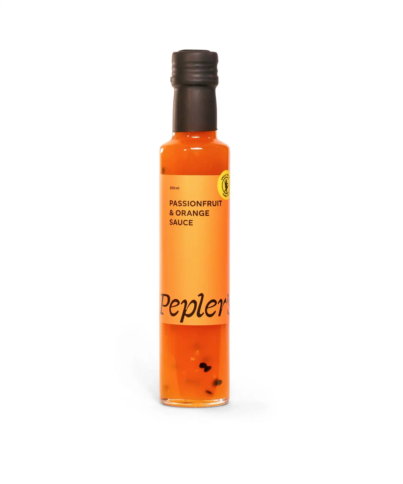 A clear glass bottle containing passionfruit and orange sauce with visible seeds and pulp inside. The label features bold black text stating "PASSIONFRUIT & ORANGE SAUCE" and the brand name "Pepler's" at the bottom. The bottle is 250 ml in size, and the overall colour of the sauce is a vibrant orange. The background is plain white, emphasising the product.