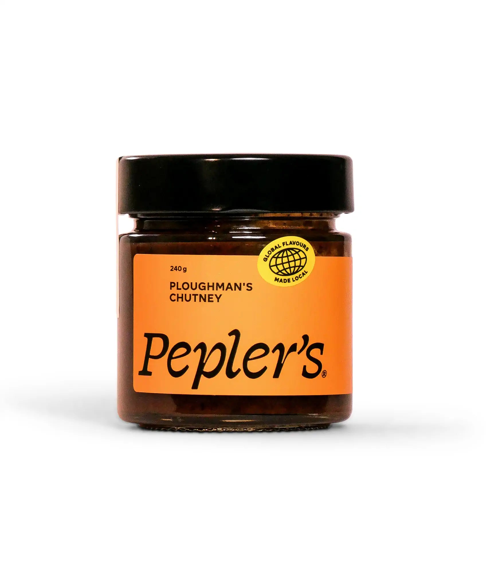 A jar of Pepler's Ploughman's Chutney, featuring an orange label with black text, displaying the weight of 240g. The jar is sealed with a black lid and has a circular label indicating "Global Flavours Made Local." The background is a soft pink, enhancing the visual appeal of the product.